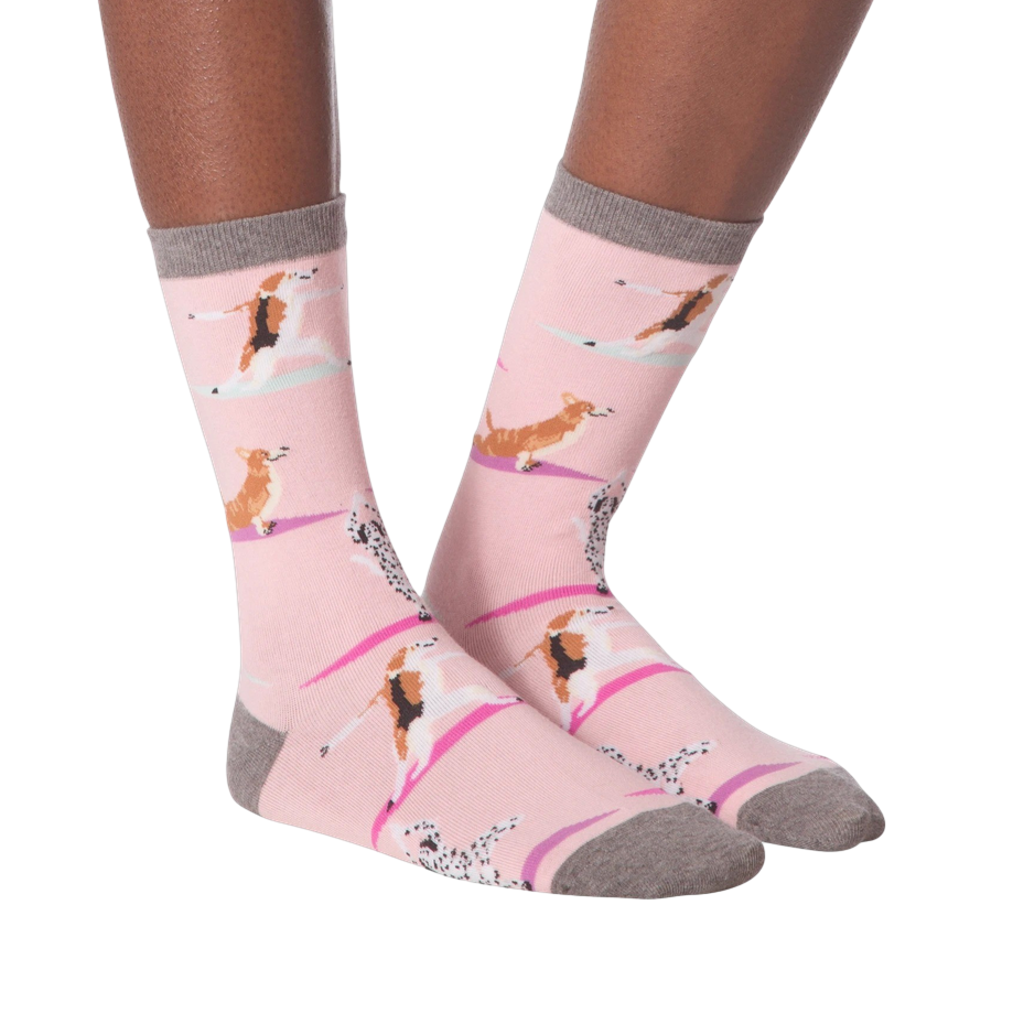 Flat lay of Yoga Dogs socks on a neutral background, showcasing the entire design.