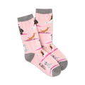 Pair of pink crew socks featuring yoga dogs in various poses. Gray cuff detail.