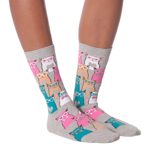 Lifestyle shot showing a model wearing white Smarty Cats socks.