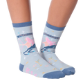 Flat lay of a pair of Sagittarius socks showcasing the design details.