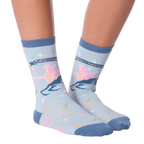 Flat lay of a pair of Sagittarius socks showcasing the design details.