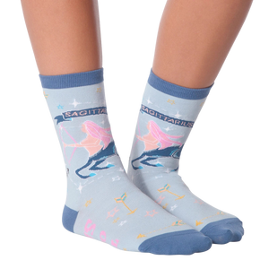 Flat lay of a pair of Sagittarius socks showcasing the design details.