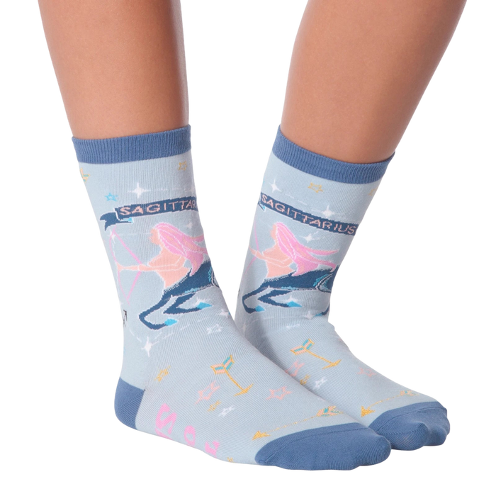 Flat lay of a pair of Sagittarius socks showcasing the design details.
