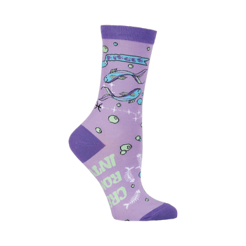 Crew socks in lavender featuring Pisces fish, bubbles, and a 'Don't Worry, Be Cappy' message. Light teal and green accents.