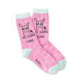 A pair of pink crew socks with a cute llama wearing sunglasses. The socks say 'No Drama Llama' and feature a light blue cuff.