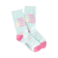 Crew socks in pastel green and pink featuring the text 'This Girl Needs a Nap' and a cartoon hand.  Sweet and funny!