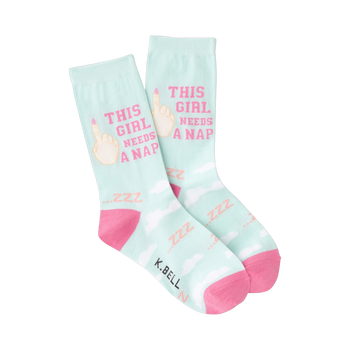 Crew socks in pastel green and pink featuring the text 'This Girl Needs a Nap' and a cartoon hand.  Sweet and funny!
