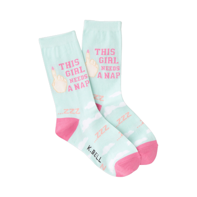 Crew socks in pastel green and pink featuring the text 'This Girl Needs a Nap' and a cartoon hand.  Sweet and funny!