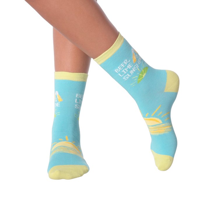 Close-up of a model's legs wearing the Beer Lime Sunshine socks.  Shows the socks on feet.