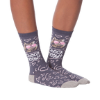 Another lifestyle shot of the socks on a person's legs from a different angle.