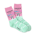 A pair of women's crew socks in pink and mint green. The socks feature a mermaid tail design and the phrase 'Always Be A Mermaid'.