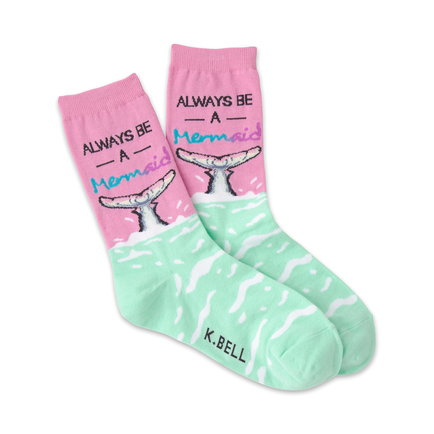 A pair of women's crew socks in pink and mint green. The socks feature a mermaid tail design and the phrase 'Always Be A Mermaid'.