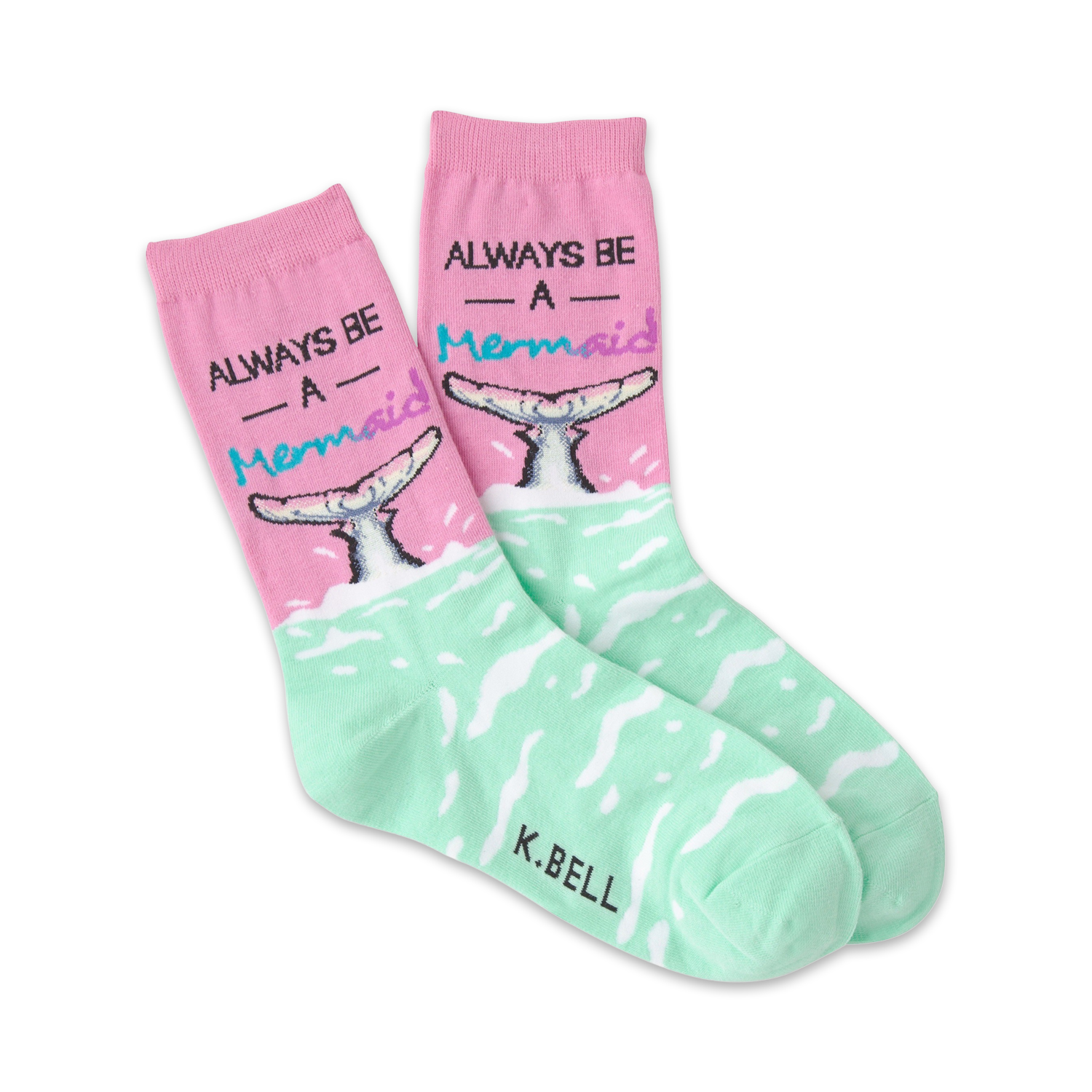 A pair of women's crew socks in pink and mint green. The socks feature a mermaid tail design and the phrase 'Always Be A Mermaid'.