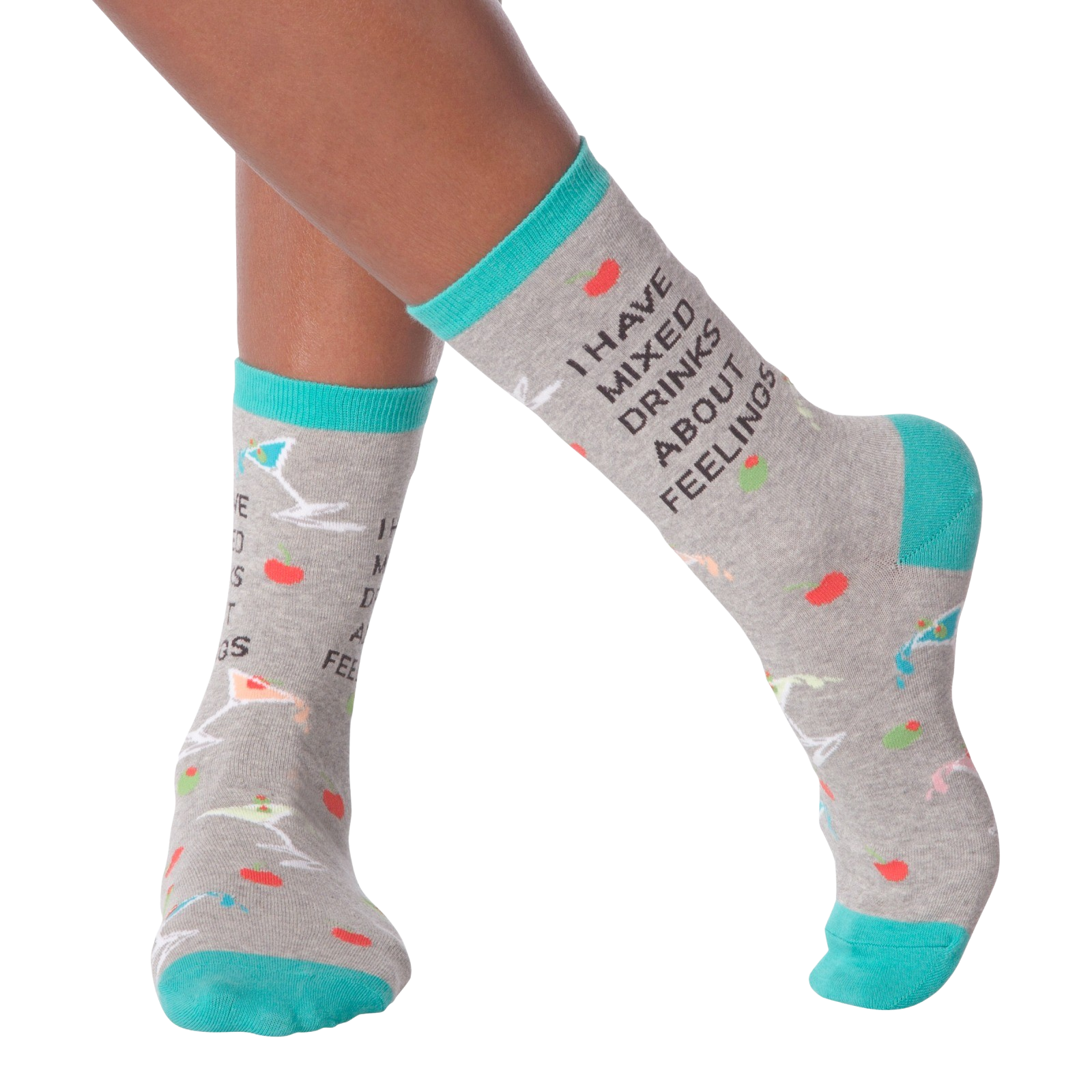 Lifestyle shot of woman's legs wearing the 'I Have Mixed Drinks About Feelings' socks, showing the fit and style on the feet.