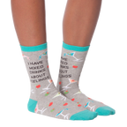Flat lay showcasing a pair of 'I Have Mixed Drinks About Feelings' socks, ideal for showing the overall design and color scheme.