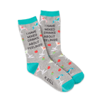Gray crew socks with teal cuffs, featuring martini glasses, olives, cherries, and the text 'I HAVE MIXED DRINKS ABOUT FEELINGS'.