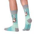 Back view of the socks on a model's legs, highlighting the fit and comfort.