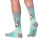 Back view of the socks on a model's legs, highlighting the fit and comfort.