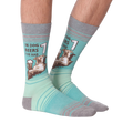 Another view of the socks on a model's legs, showing how they look from a different angle.