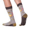 Lifestyle shot showing the socks on a person's feet, demonstrating fit and style.