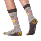 Lifestyle shot showing the socks on a person's feet, demonstrating fit and style.