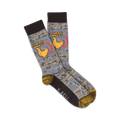 Pair of crew socks in grey, brown, and yellow.  Features a funny illustration of a chicken and the text 'Guess What?'
