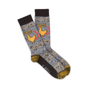 gray crew socks with yellow chicken feet pattern and the words 
