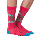 Lifestyle shot showing the Bigfoot Boombox socks on a person's feet; showcasing the socks' fit and style.