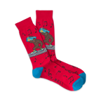 Pair of red crew socks with a cartoon Bigfoot carrying a boombox.  Musical notes and teal cuffs add to the fun, 80s-inspired design.