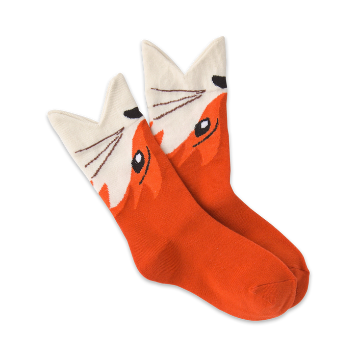 orange, white, and black fox themed kids crew socks featuring sly fox face.  