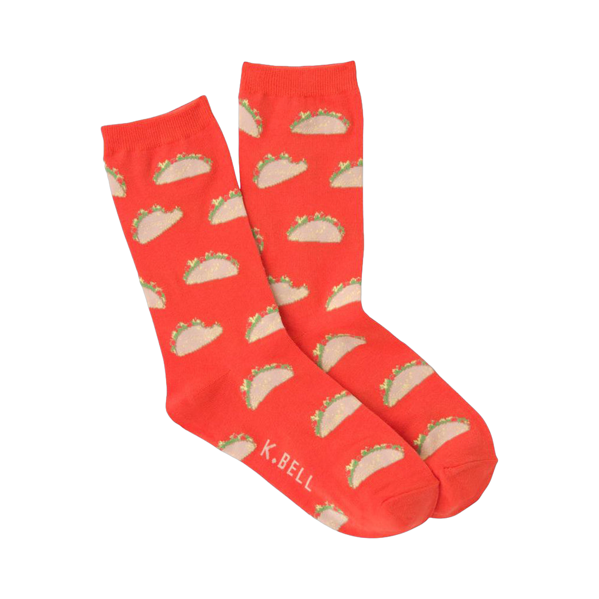 A pair of orange crew socks featuring a repeating pattern of small, illustrated tacos. The tacos are light brown with green and tan details.
