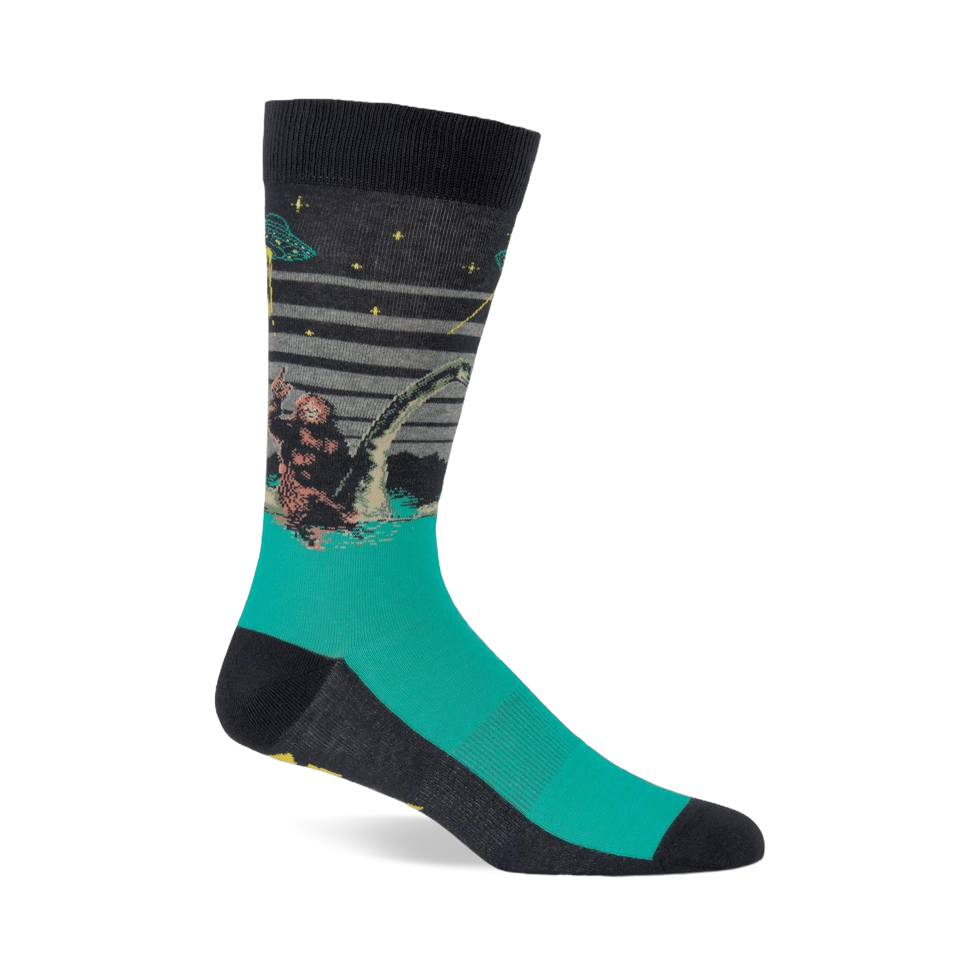 Single crew sock with dark grey top and teal foot, depicting Bigfoot, Loch Ness Monster, and a UFO at night.