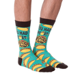Another product shot of the 'You Had Me at Tacos' socks, showcasing the full sock design from a slightly different angle.