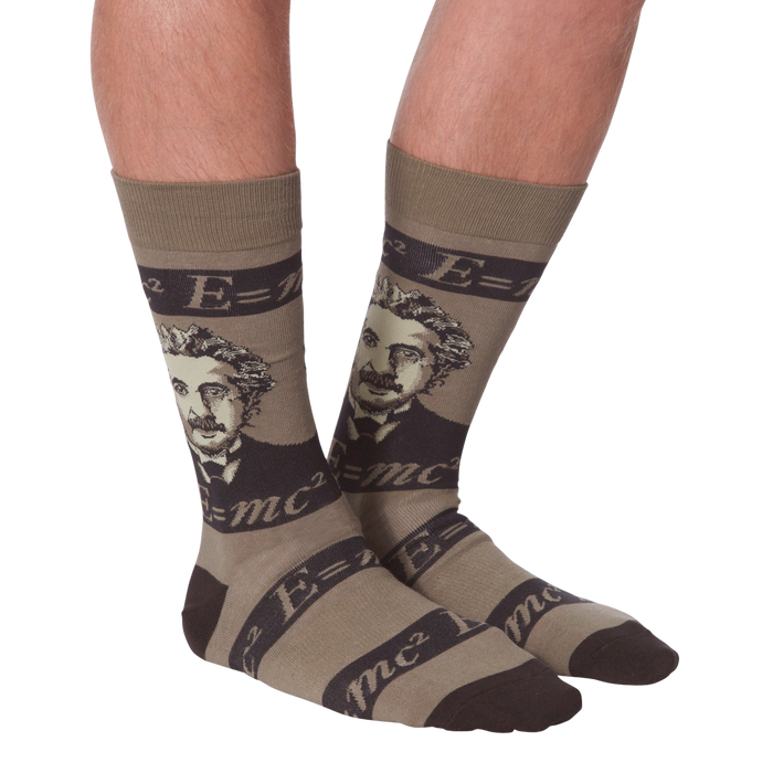 A pair of brown crew socks with a portrait of Albert Einstein and the equation E=mc2.