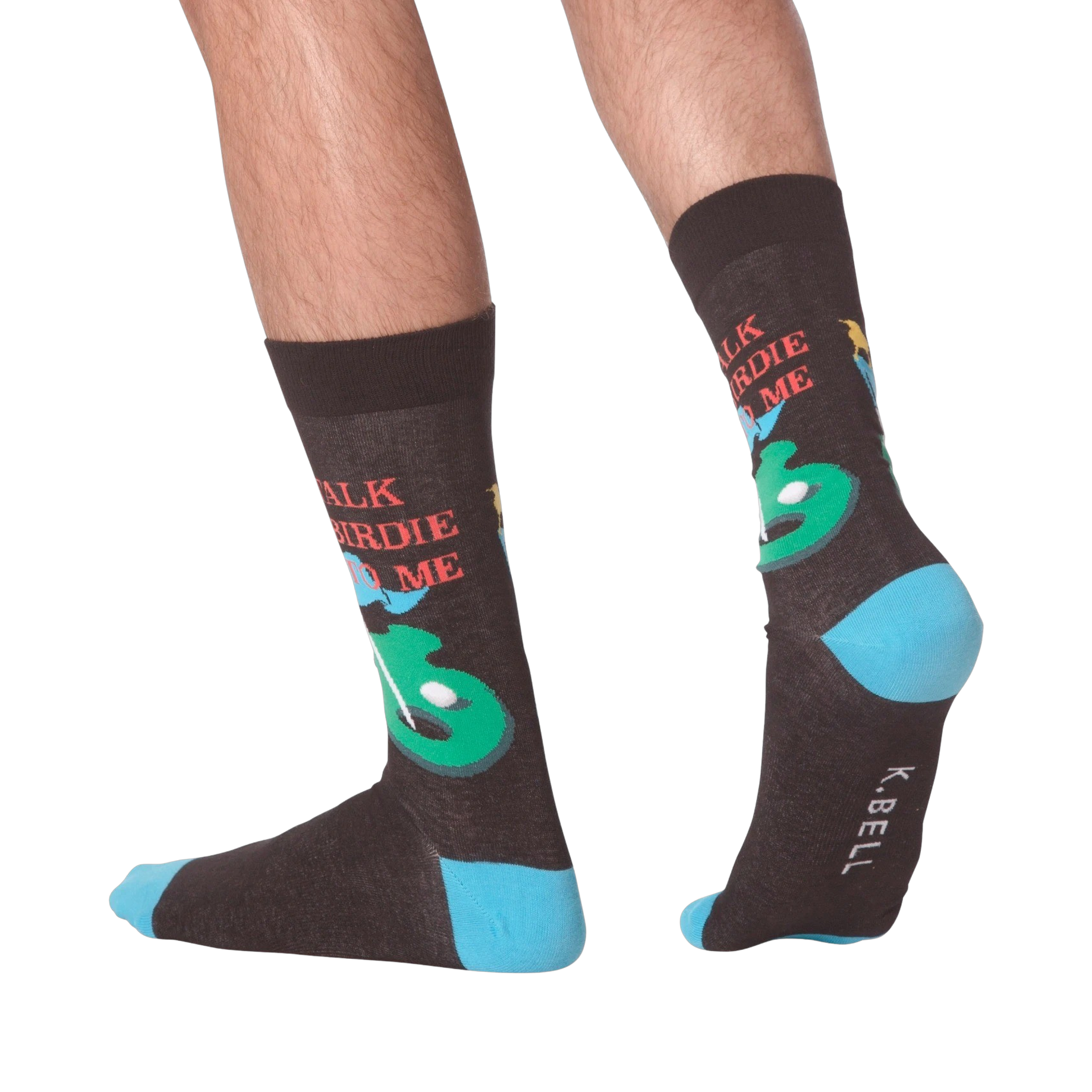 Lifestyle shot showing the 'Talk Birdie To Me' socks on a person's feet.