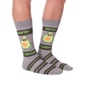 A flatlay product shot of Avocardio socks.  Highlights the design details and colors.