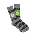 Crew socks in gray with lime green stripes.  A cartoon avocado with sunglasses jump ropes on the socks.