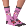 Close-up shot: A pair of 'I Go Both Ways' socks, showcasing details like wine bottle and glass designs.