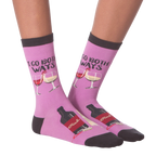 Close-up shot: A pair of 'I Go Both Ways' socks, showcasing details like wine bottle and glass designs.