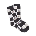 Pair of black and white crew socks with a checkered pattern and cute cat faces.