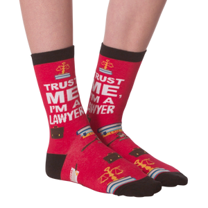 A pair of red socks with the words 