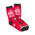 Pair of red crew socks with black cuffs.  The socks feature a repeated design of scales of justice, briefcases, and the text 'Trust Me, I'm a Lawyer'.