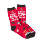 Pair of red crew socks with black cuffs.  The socks feature a repeated design of scales of justice, briefcases, and the text 'Trust Me, I'm a Lawyer'.