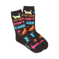 A pair of dark-colored crew socks with a playful design. The socks feature colorful cat silhouettes, paw prints, and the text 'Cat Hair Don't Care'.