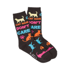 A pair of dark-colored crew socks with a playful design. The socks feature colorful cat silhouettes, paw prints, and the text 'Cat Hair Don't Care'.