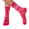 Lifestyle shot of 'Ain't My First Rodeo' socks on a person's legs.