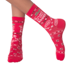 Lifestyle shot of 'Ain't My First Rodeo' socks on a person's legs.