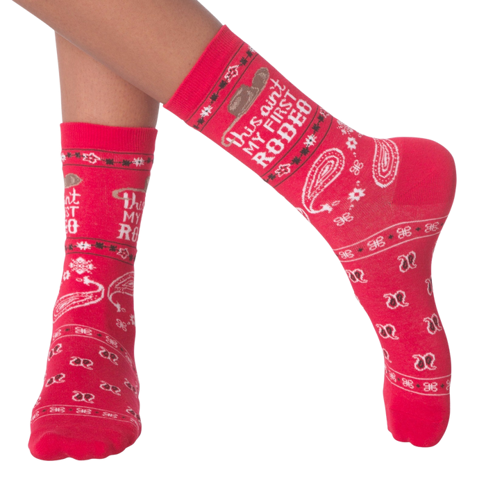 A pair of red socks with the text 