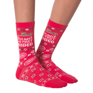 A pair of red socks with the text 