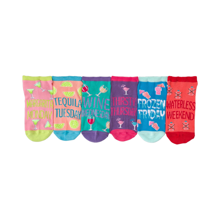 Six ankle socks shown in a row. Each sock has a different color and features a cocktail-themed design with text like 'Margarita Monday'.